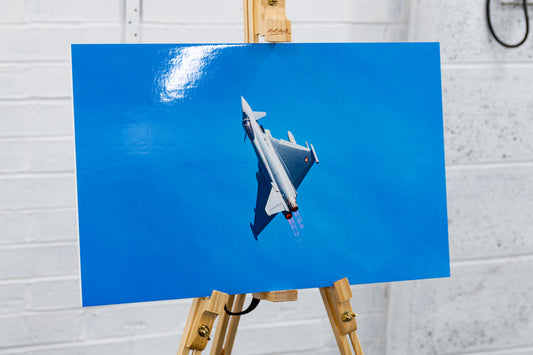 Wide three-quarter view of Typhoon climbout glossy print on easel, studio setting