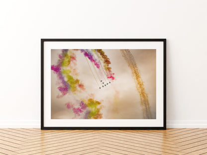 Al Fursan UAE aerobatic team looping through coloured smoke, aviation photo wall art print in a black frame