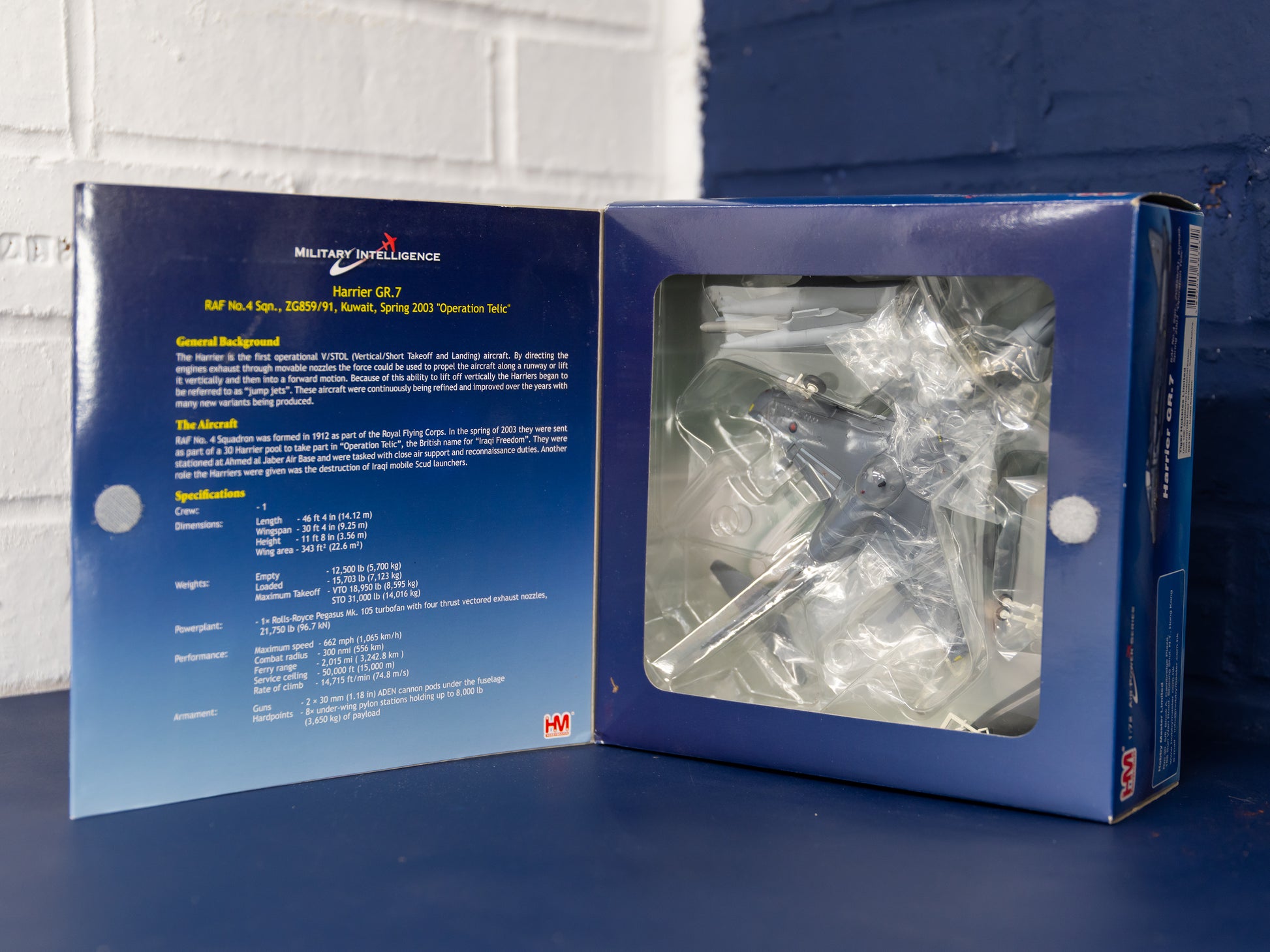 Open flap view of HA2601 with inner text panel and factory-bagged model visible through window.