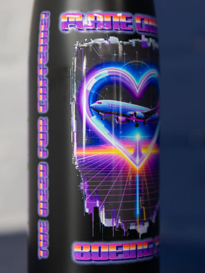 Close-up of artwork panel and “Plane Crazy” text on black finish.