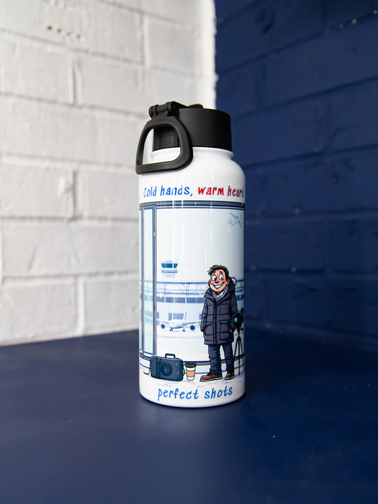 Front view with cartoon aviation photographer artwork and text “Cold hands, warm heart… perfect shots”.