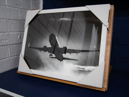 Front view of framed Jet2 Boeing 737 departure print with corner protectors in place.