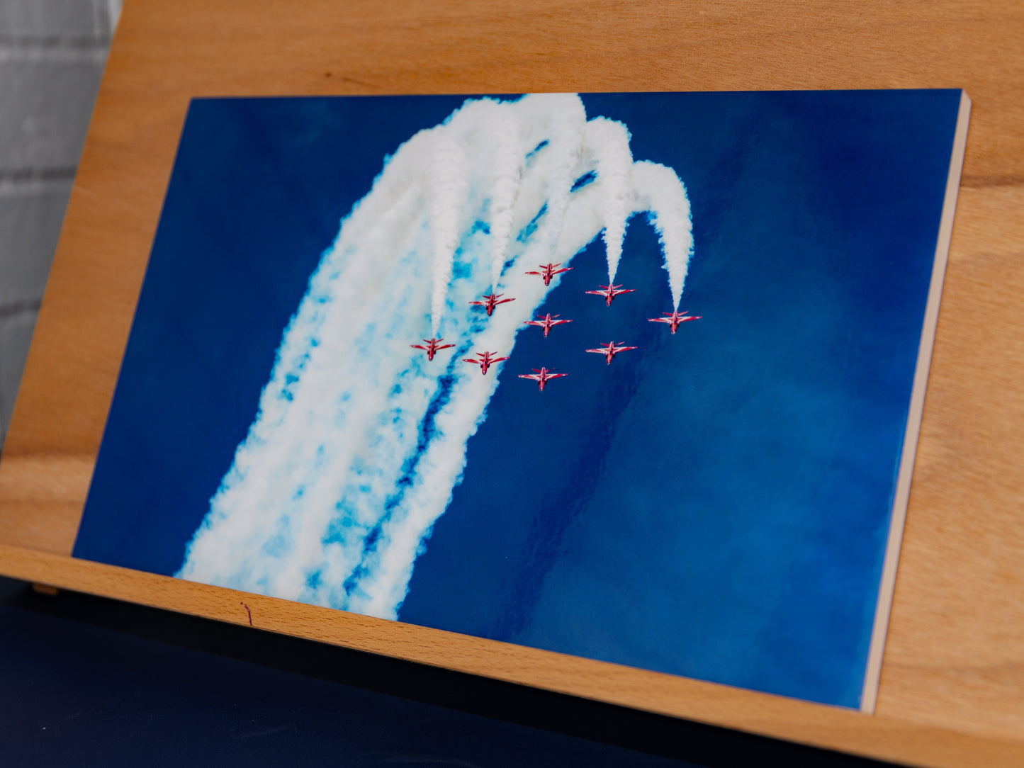 Angled view of Red Arrows metallic print mounted on 5 mm foamboard.