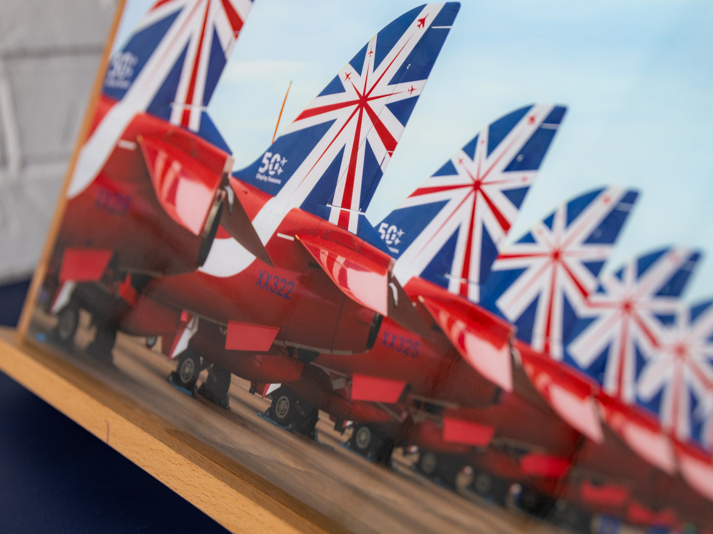Angled close-up showing Union Flag tail livery and high-gloss finish.