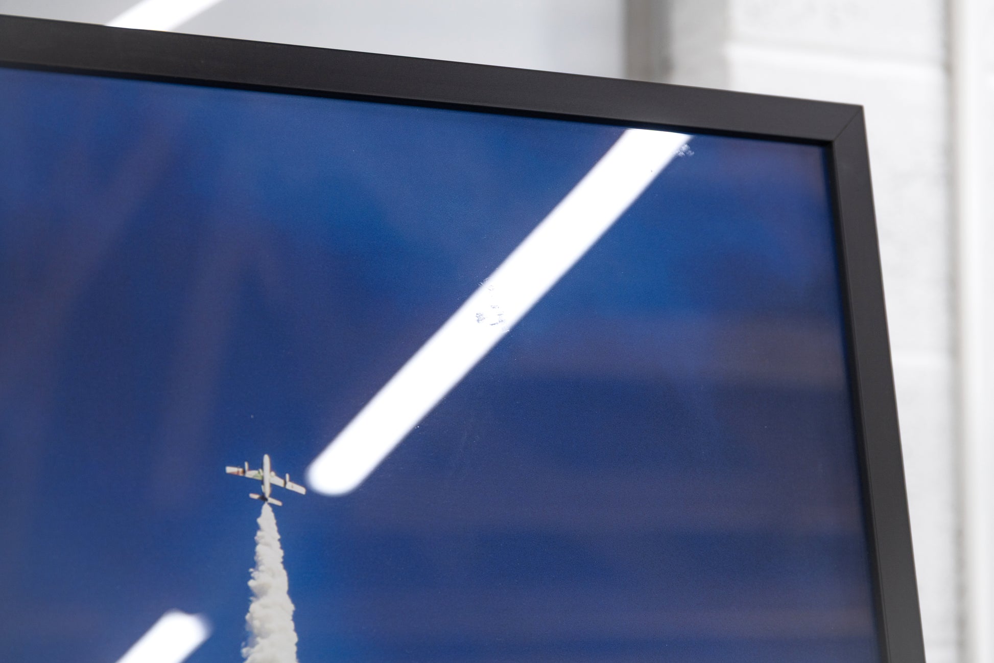 Another angle of the upper glazing area showing light surface blemishes