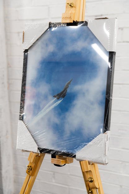 Three-quarter right view of framed Aeronautica Militare Typhoon ascent print, wrapped and corner-protected on a studio easel.