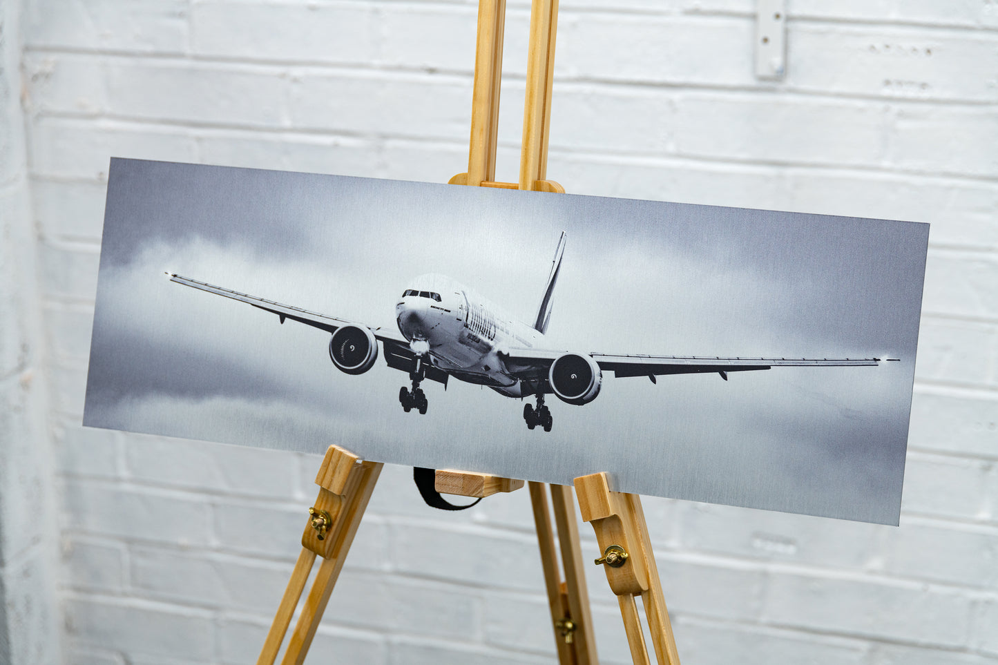 Angled view of the panoramic print with Emirates 777-300ER centred, showing even finish across the panel.