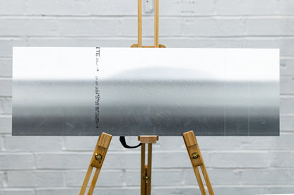 Back of brushed aluminium panoramic panel showing clean, unmarked surface from ex-display sample.