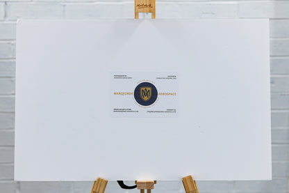 Back of mounted print with Marqforde Aerospace label on white 10 mm foamboard.