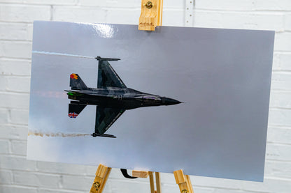 Front three-quarter product shot of the F-16 display jet print, metallic finish emphasized.