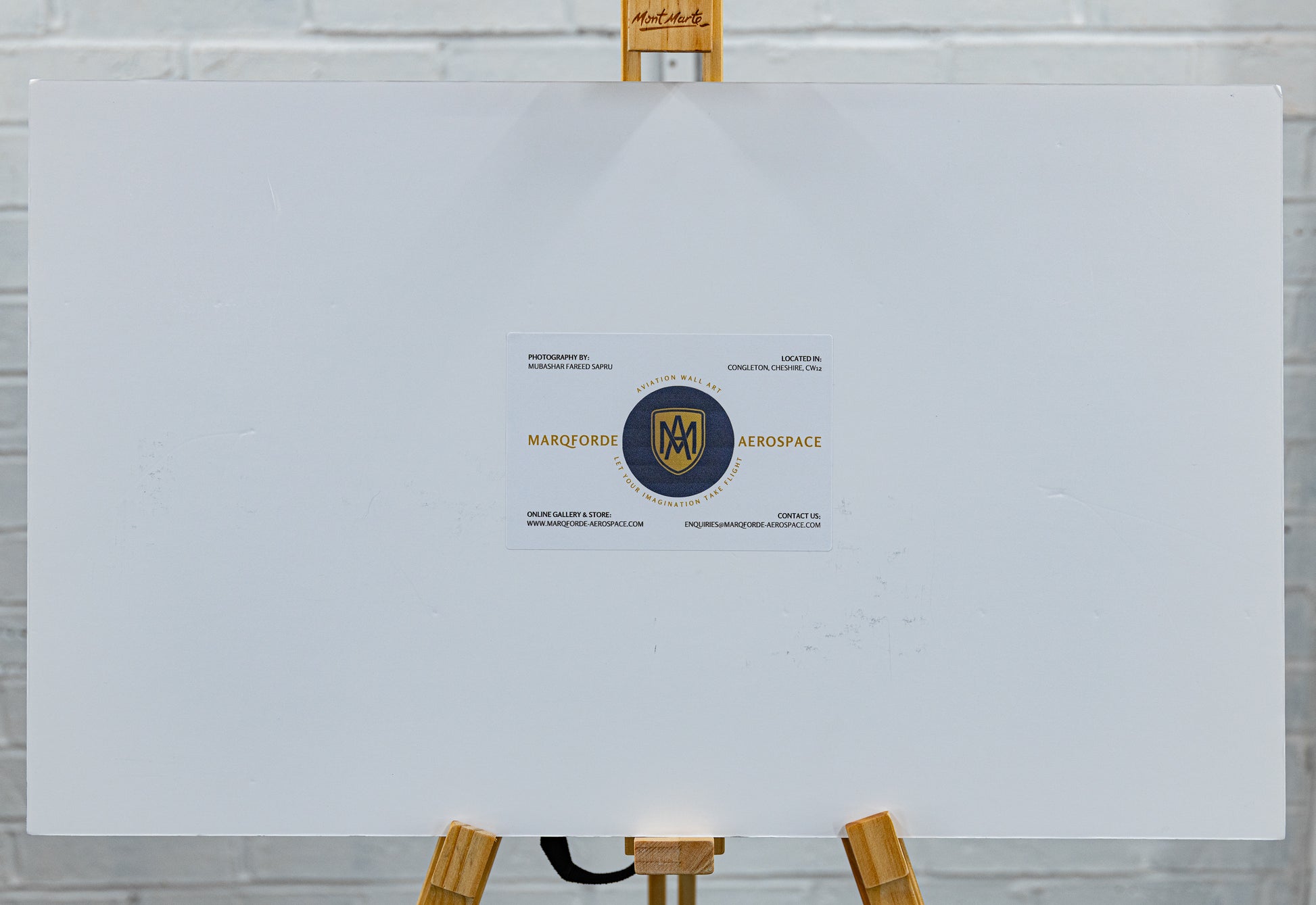 Rear view of the mounted metallic photo print on 10 mm foamboard with Marqforde Aerospace label.