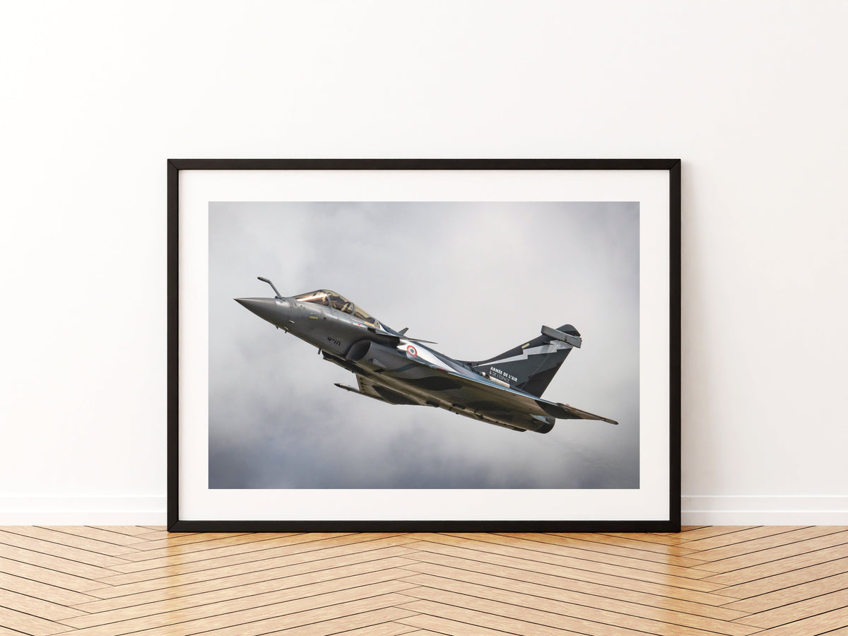 French Navy Dassault Rafale M banking under grey cloud, aviation photo wall art print in a black frame