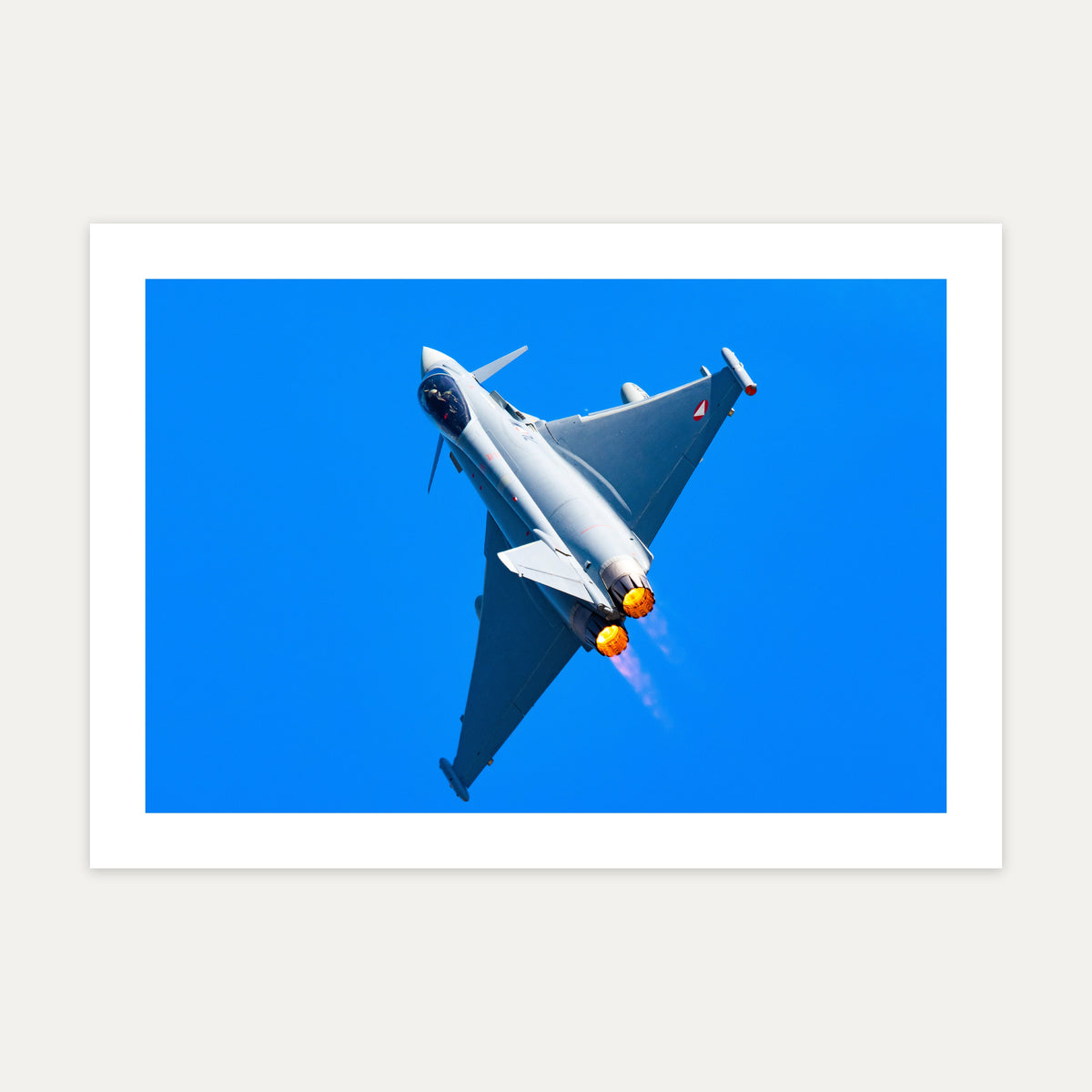 Austrian Air Force Eurofighter Typhoon climbing with afterburners lit against a deep blue sky, unframed A4 aviation photo print