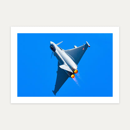 Austrian Air Force Eurofighter Typhoon climbing with afterburners lit against a deep blue sky, unframed A4 aviation photo print